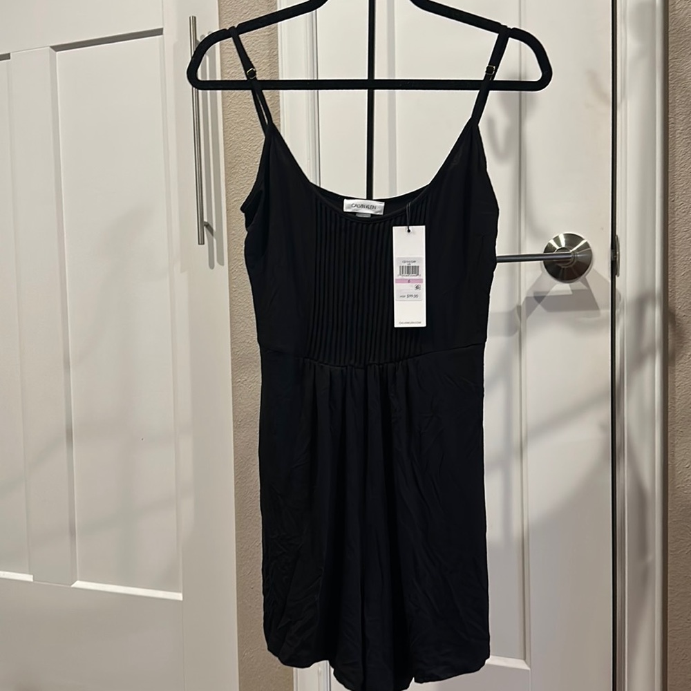 Black Calvin Klein sumner tank and short jumper. 95% rayon and 5% spandex